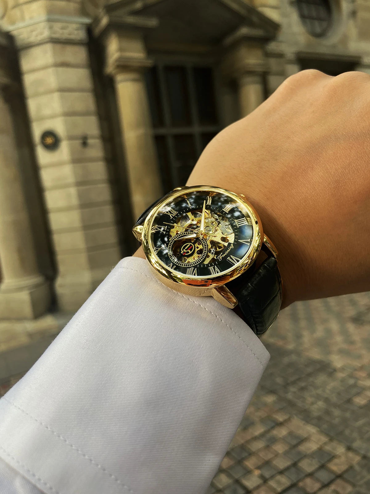 Luxury Men's Skeleton Mechanical Watch with 3D Logo Design and Hollow Engraving in Black and Gold Leather Case